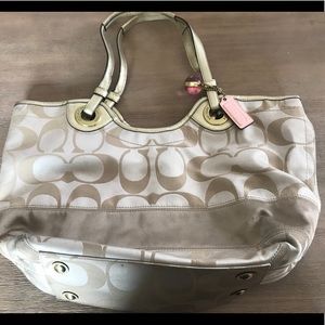 Tan and gold Coach purse